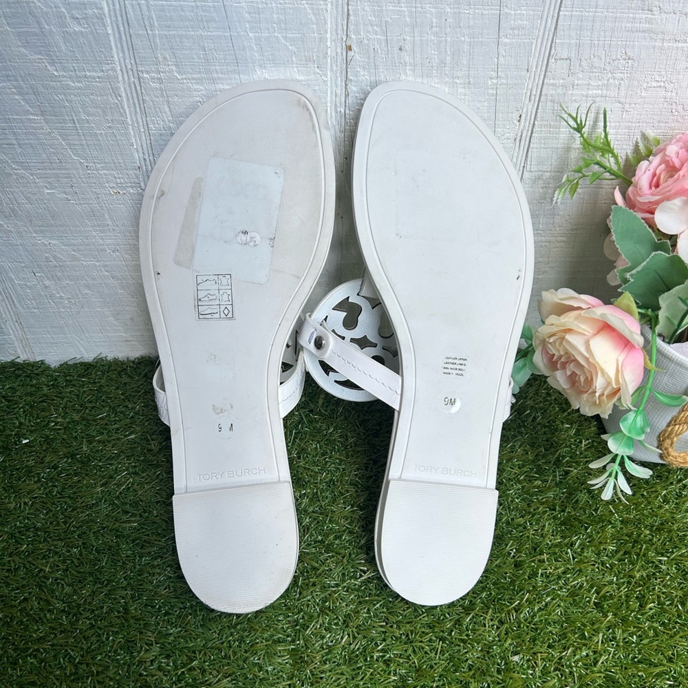 Tory Burch 
Miller cut-out leather flip-flops
$267 Sandals Sz 59 optical white - Picture 16 of 16